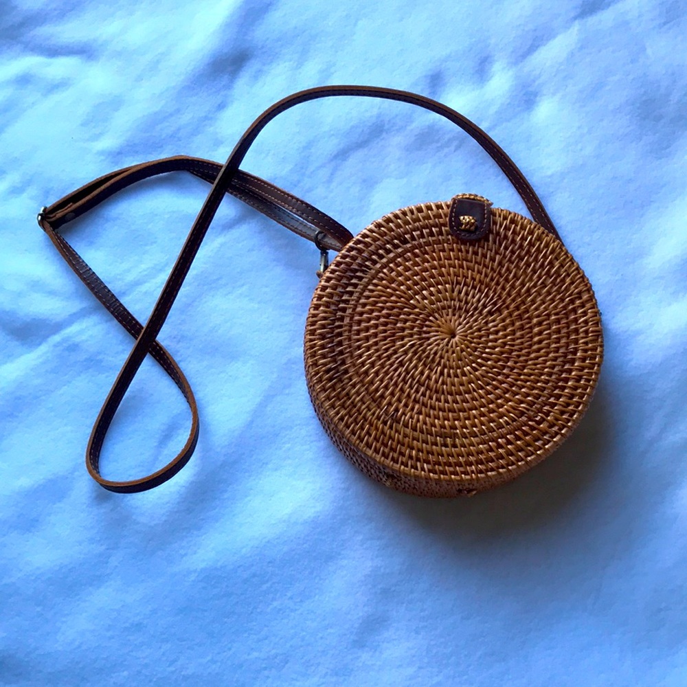 Circular rattan crossbody bag.  Excellent condition.